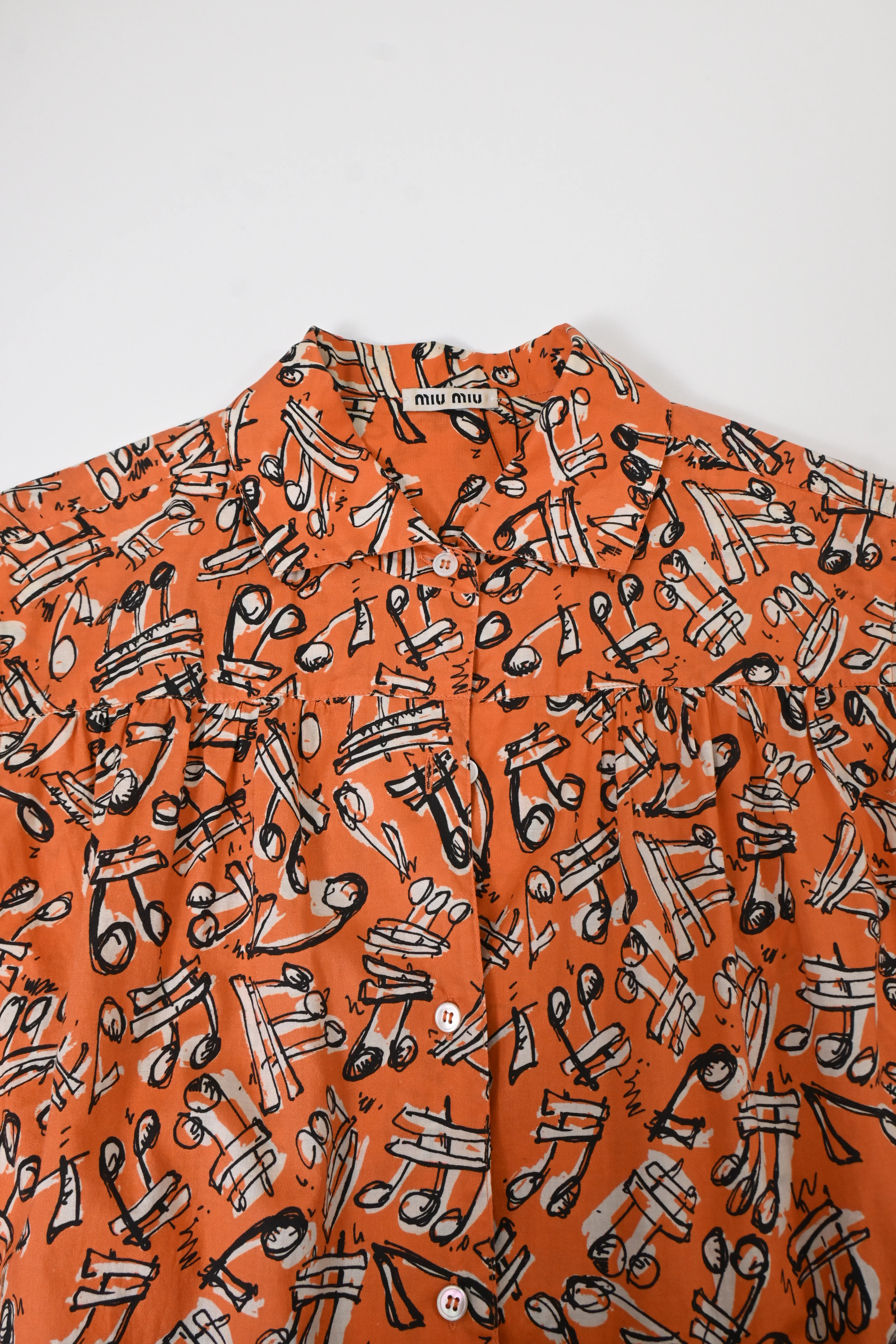Women's Miu Miu Music Notes Printed Sleeveless Blouse in Orange Cotton - Image 10